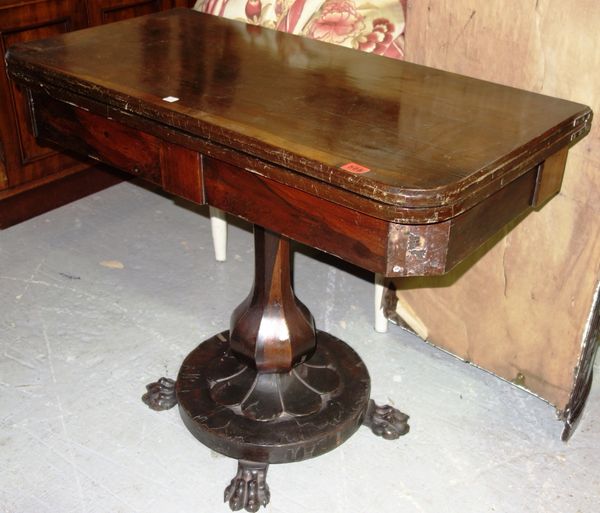 A 19th century rosewood fold over card table.  DIS