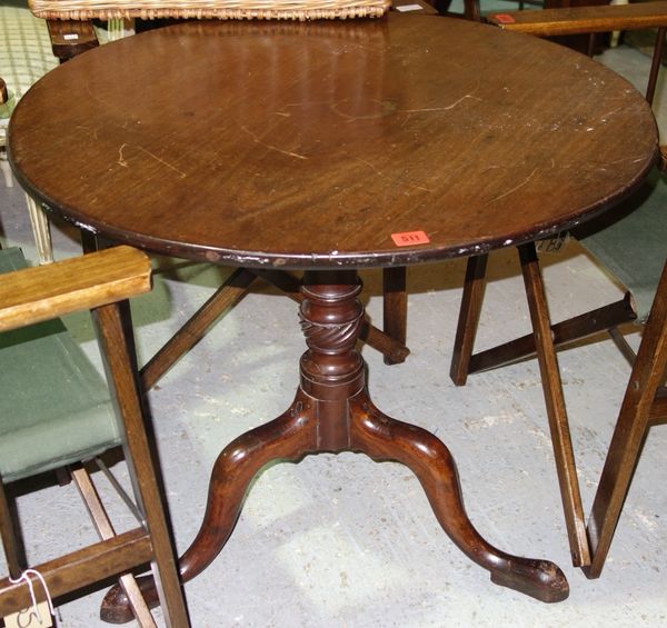 A 19th century mahogany circular tripod table.  L7