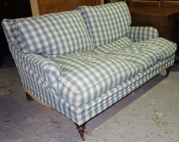 A blue checked upholstered Howard style two seat sofa, 143cm wide.  H3