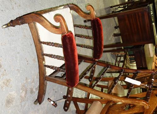 A 19th century simulated rosewood spindle back adjustable open armchair.  G4