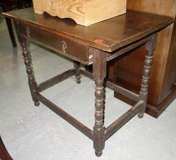 An 18th century oak single drawer side table, on bobbin turned supports, united by perimeter stretcher, 90cm wide.  G6