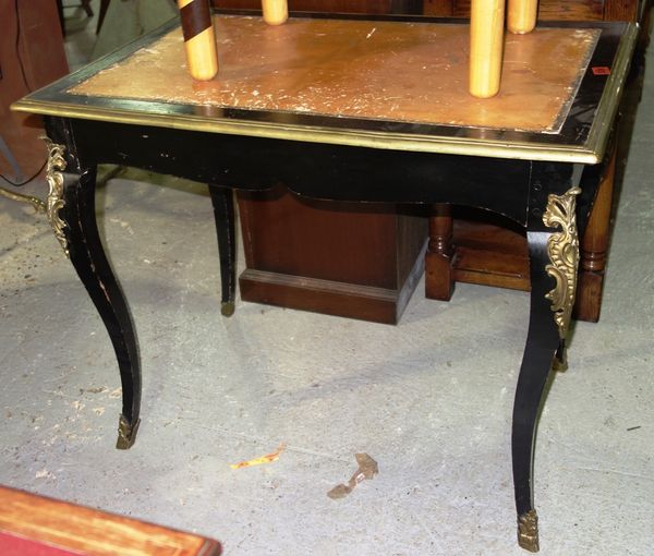 A 19th century French gilt metal mounted ebonised bureau plat, with single frieze drawer, on cabriole supports, 87cm wide.  H6