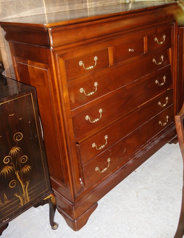 A 20th century hardwood chest of drawers with two long drawers, 135cm wide.  L1