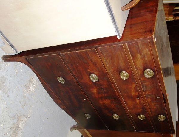 A George III mahogany chest of four long graduated drawers, on splayed feet, 102cm wide.  I2