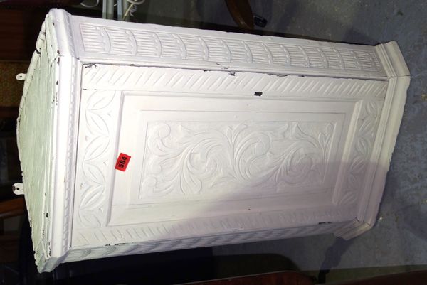 A 18th century oak white painted hanging corner cupboard, 48cm wide.  C3