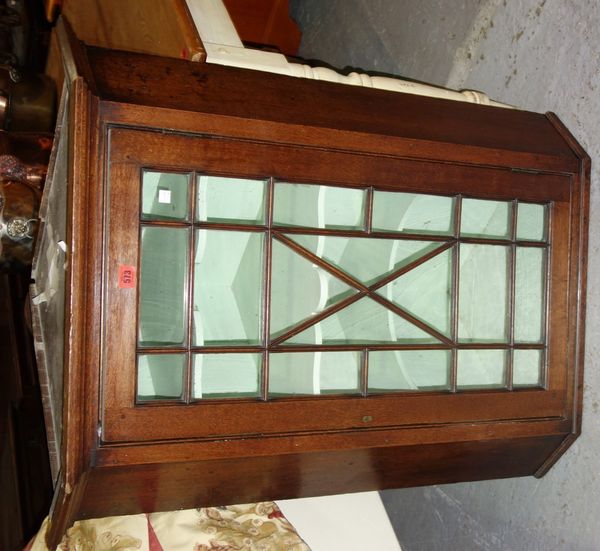 A 19th century mahogany glazed single door corner cupboard, 79cm wide. DIS