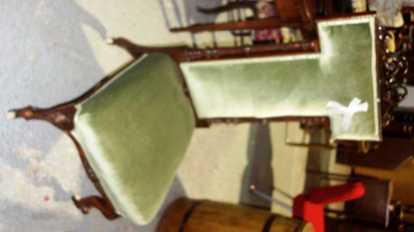 A 19th century mahogany green upholstered high backed nursing chair.   H4