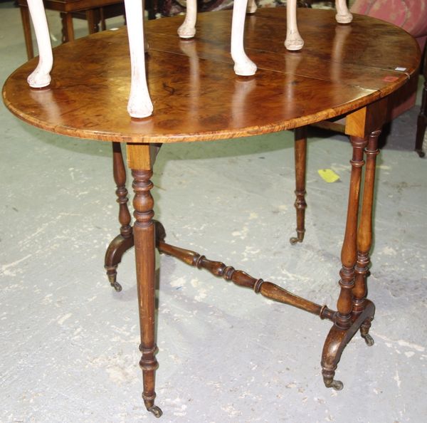 A Victorian walnut Sutherland table.  I7