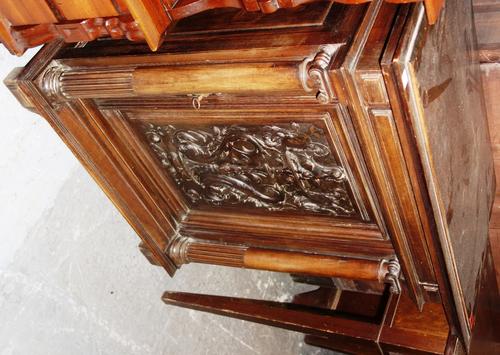 A carved walnut base for a polyphon, 76cm wide.   DIS