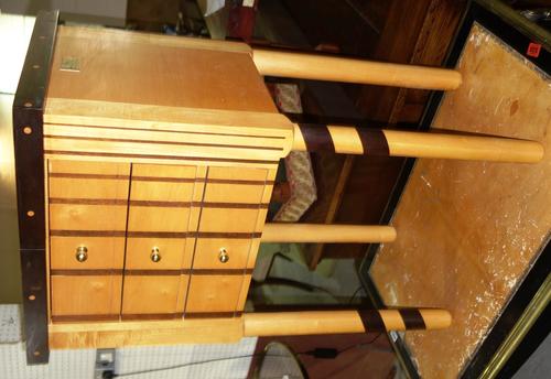 A small chest of drawers, 53cm wide and a coffee table by Corrie Lynn & Co, Kwa Zulu, South Africa,  97cm wide, (2).  G6