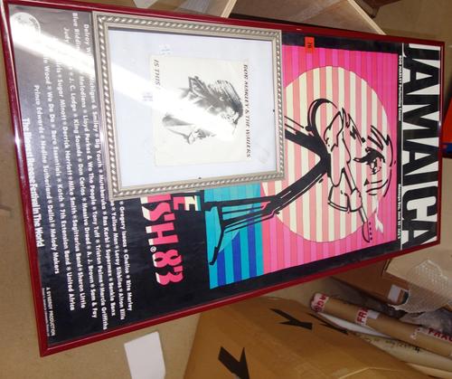 A framed and glazed Bob Marley & the Wailers 'Is This Love' single bearing signature together with a large Jamaican advertising poster. All potential
