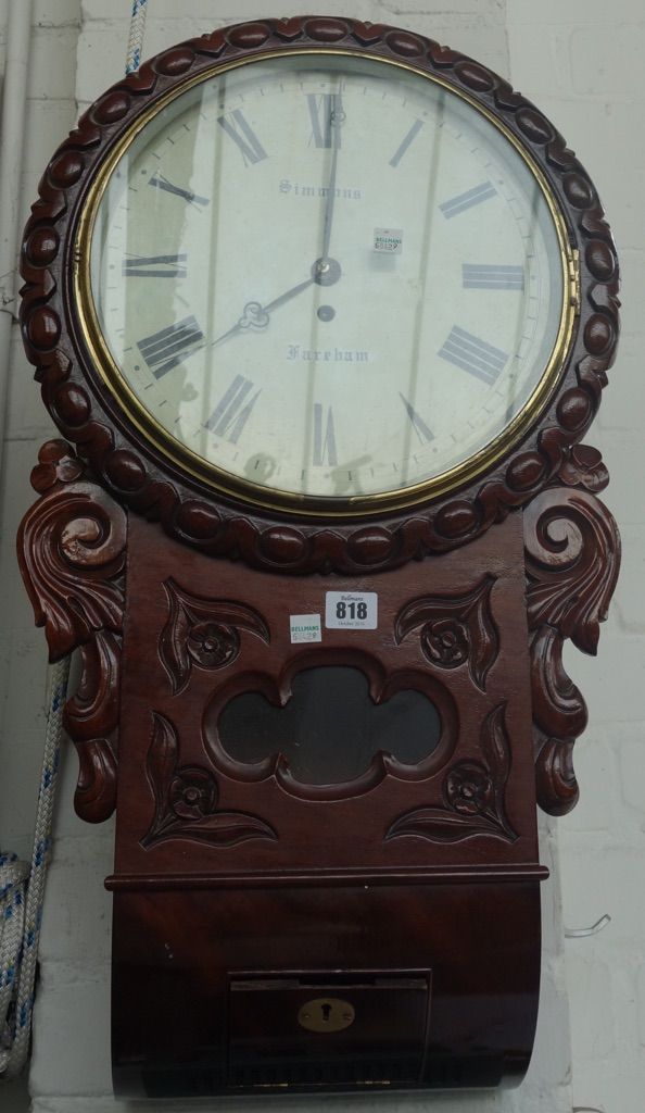 A mahogany cased drop dial wall clock, 19th century, the 12 inch painted tin dial detailed 'Simmons Fareham', with central glazed pendulum aperture, c