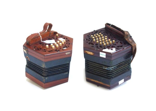 A Lachenal & Co concertina, 19th century, with forty seven bone buttons on pierced mahogany ends, with six fold bellows (a.f), together with another c