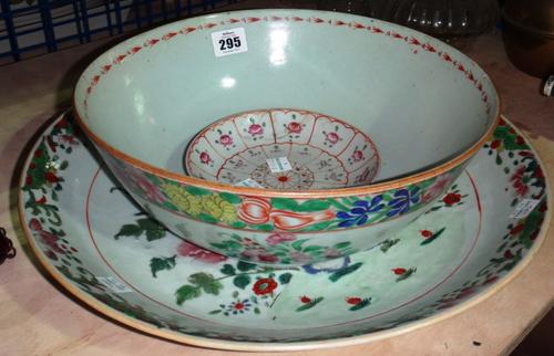 A pair of gilt metal five branch candelabra, late 19th/early 20th century, each cast as a bunch of flowers protruding form a two handled urn, on a fol