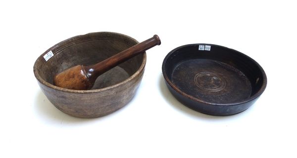A 19th century fruitwood pestal of graduated turned form, 30.5cm, and two 19th century carved wooden bowls (3).