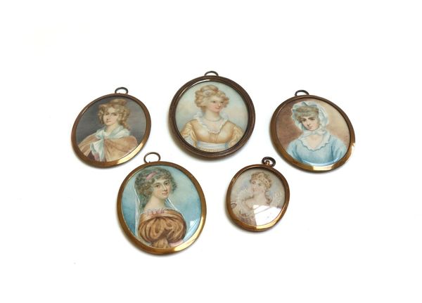 A late 19th/early 20th century Continental portrait miniature on ivory of a fashionable woman in Regency style dress, 7cm; and four others similar (5)