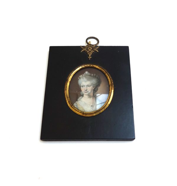 An 18th century portrait miniature on ivory depicting Queen Charlotte, in a gilt metal and ebonised frame, the plaque 5.5cm high.