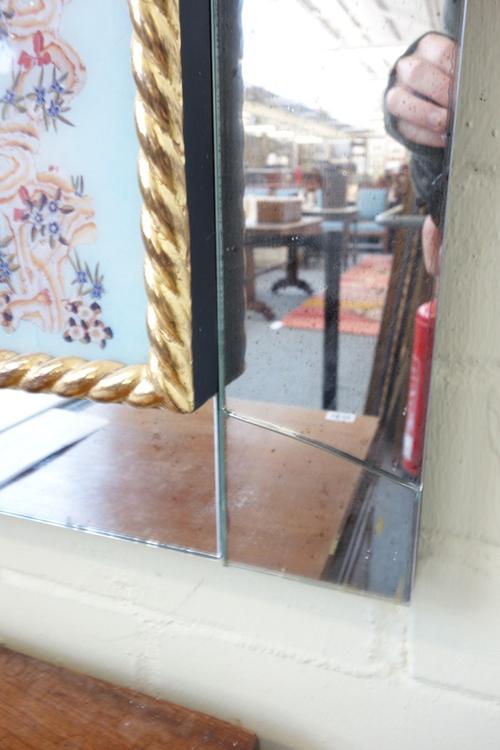 A rectangular glass wall mirror, 20th century with chinoiserie border and gilt embellishments, 140cm x 95cm.