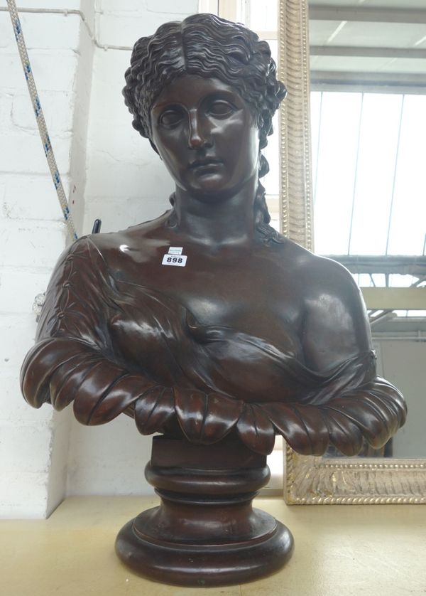A French bronzed copper electrotype bust of Clytie, probably French, late 19th century, set on an integral waisted socle, 71cm high.