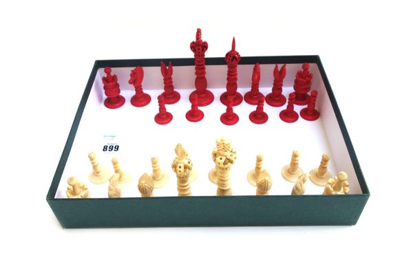 A late 19th century stained ivory chess set of turned and carved form, the King 12cm high (a.f), and a Chinese chinoiserie decorated folding chess/bac
