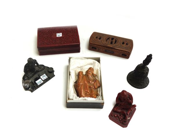 A 19th century Chinese red cinnabar lacquer figure, signed, 7cm high, a cinnabar lacquer rectangular lidded box, 14cm wide, an Indian carved hardstone