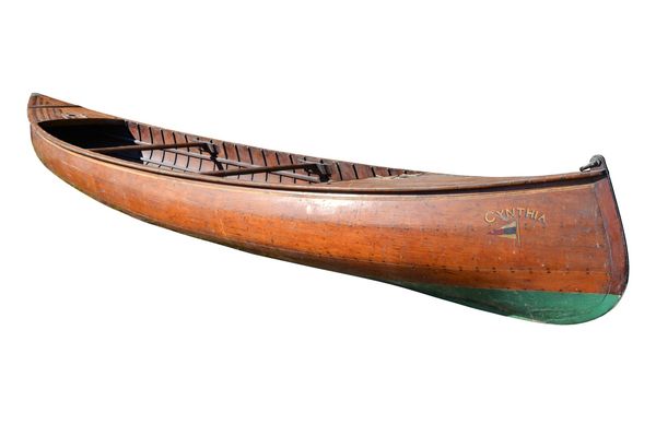 A sailing canoe, late 19th century, probably built by R.J. Turk Co, Thames London, gilt name to bow 'Cynthia', 450 cm long. Illustrated