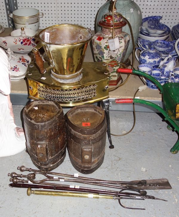 Two oak and iron bound kostrels, 18th century, with carved initials 'I.T', 27cm, a brass and iron trivet, a set of three steel fire irons, a Georgian