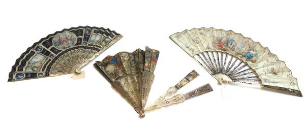 Two late 18th century painted paper fans, each with carved and pierced ivory sticks, 28cm and one further 18th century painted paper fan with pique wo