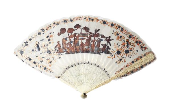 A Cantonese painted feather fan, 19th century, depicting a figural landscape group with applied ivory faces, the sticks ornately carved with Oriental