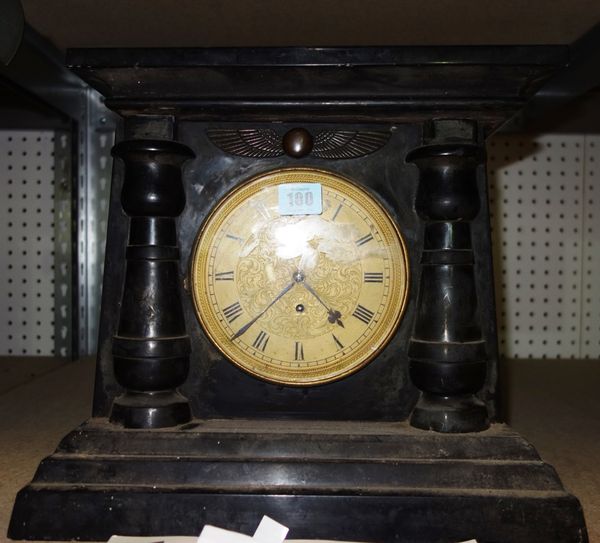 A large 19th century black slate cased mantel clock.