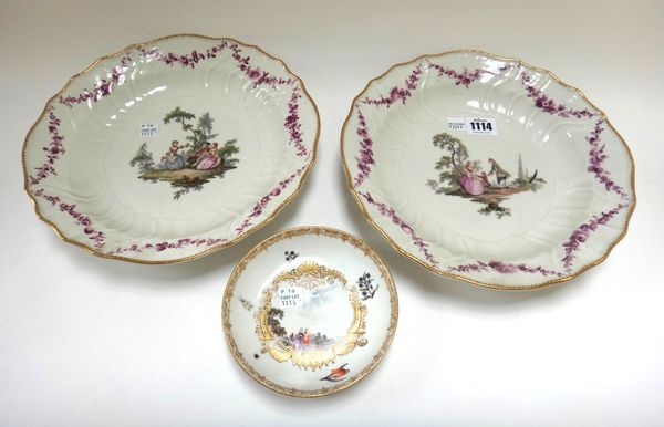 Two Meissen porcelain dishes, circa 1760, each centrally painted with family groups, within a shaped basket weave wide border decorated with swags of