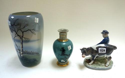 A Royal Copenhagen 'Boy with Calf' porcelain figure group, no.772, 17cm high, together with a large Royal Copenhagen vase decorated with a landscape,