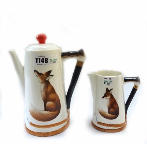 A Royal Doulton 'Reynard the Fox' six piece coffee service, circa 1930, comprising; a coffee pot, 20cm high, a water jug, two milk jugs, a two handled
