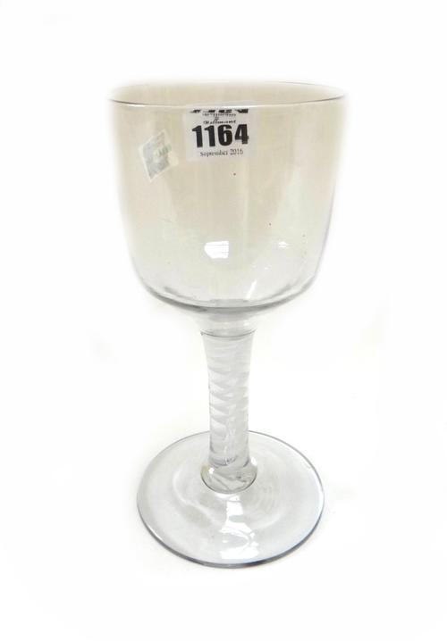 An opaque twist wine goblet, circa 1765, with large ogee bowl and circular foot, 18.5cm high.