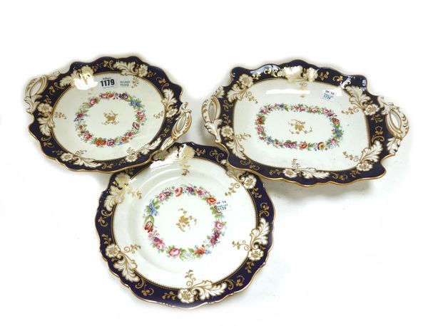 An English porcelain dessert service, probably Ridgway, mid 19th century, pattern no.1557, decorated with a central band of flowers within a wide coba
