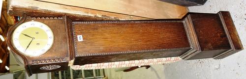 A small oak longcase clock and a bird cage, (2).