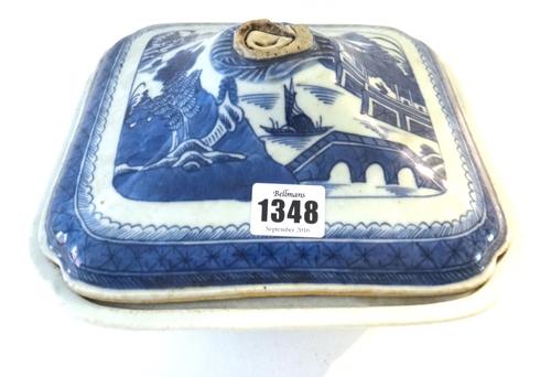 A group of Chinese blue and white porcelain, 19th century, each painted with a river landscape, comprising; tureen and cover; three octagonal serving