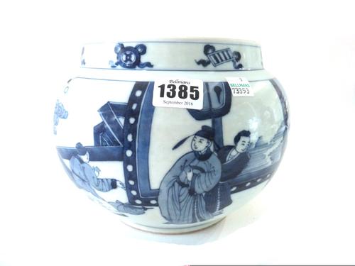 A Chinese porcelain blue and white jardiniere, 20th century, painted in Kangxi style with figurative panels, 17.5cm. high.