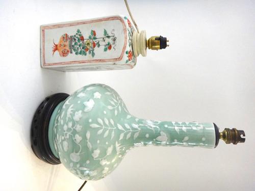 A Chinese famille-verte vase, Kangxi, of square section, each side painted with a vase of flowers, adapted as a lamp, (a.f), 21.5cm. high excluding fi