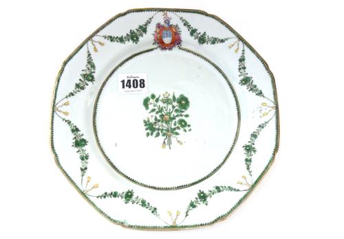 A set of nine Chinese export armorial plates made for the Portuguese market,  Qianlong, circa 1775, each painted in green and gilt with a central grou
