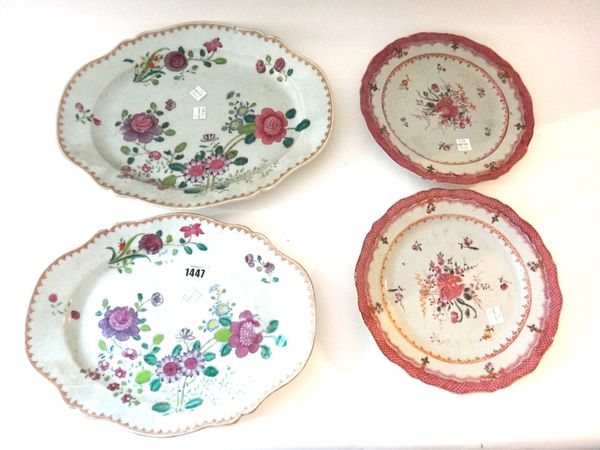 Two Chinese export famille rose graduated shaped oval dishes, Qianlong, each painted with flower sprays inside a spearhead border, largest 36cm. wide;