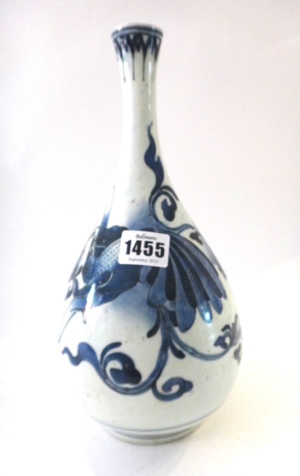 A Japanese blue and white pear shaped vase, probably  Edo period, 18th century, painted with two birds amongst flowers, 28cm. high.
