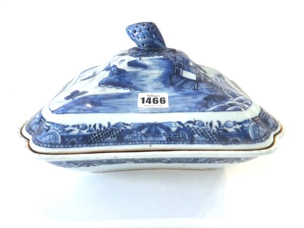 A Chinese export blue and white tureen and cover, circa 1800, of shaped rectangular form, the cover painted with a river landscape, set with fruit kno