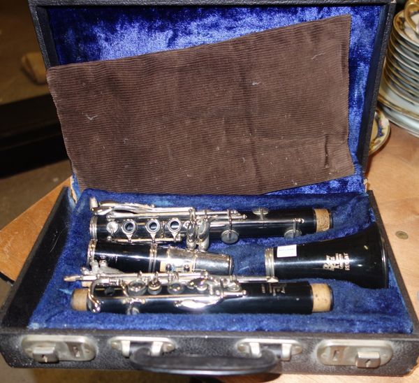 A Boosey and Hawkes four piece clarinet cased.