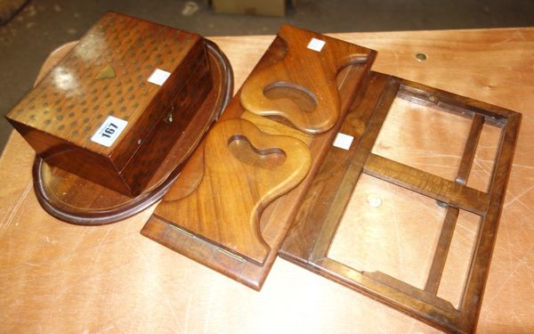A rosewood and brass inlaid box, a mahogany book slide, a mahogany reading stand and a small oval mahogany galleried tray, (4).