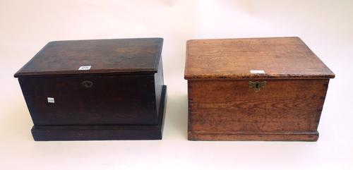 A small 18th century oak trunk on a plinth base, 41cm wide, together with a similar pine example, 14cm wide, (2).