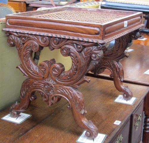An 18th century Italian parquetry and bone inlaid rectangular box on turned brass feet, 22cm wide.
