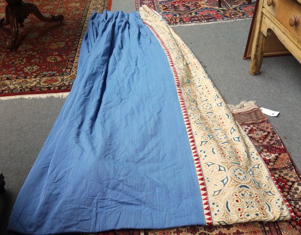 Two pairs of lined blue curtains, with a Gothic Revival strip, each 180cm wide at the top (400cm wide at the bottom) x 290cm long. (4)