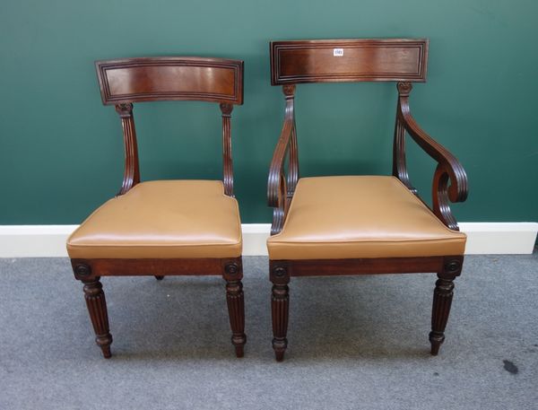 A set of eight George III mahogany framed dining chairs, with straight front seats and reeded supports, to include a pair of carvers, (8)