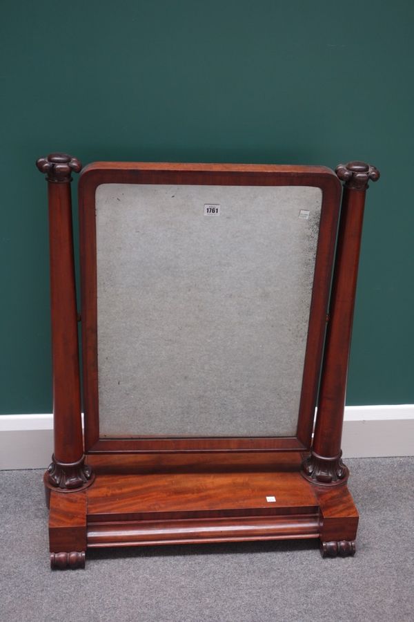 A William IV mahogany toilet mirror with cushion drawer base on scroll feet, 68cm wide.